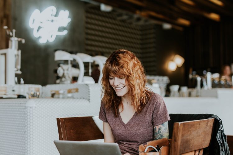 Freelancer looking at her computer